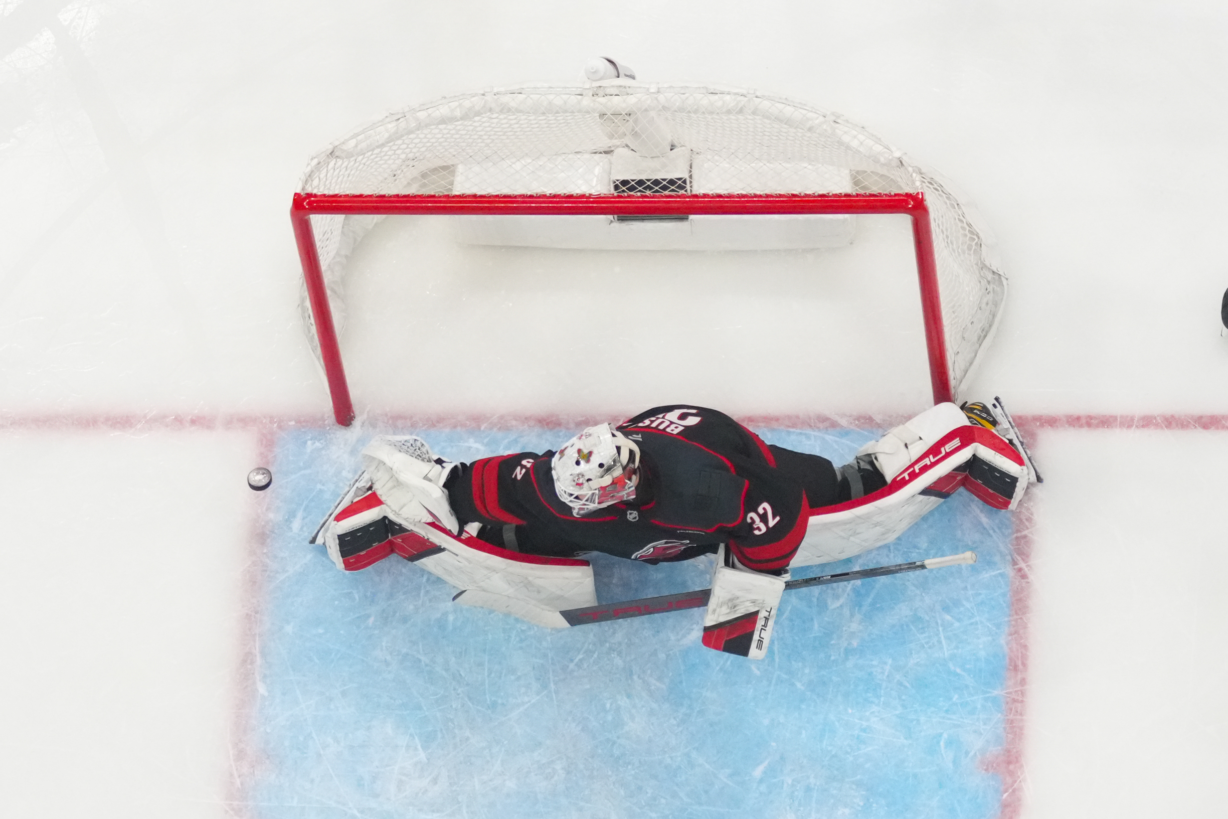 Goaltender Brandon Bussi (32) blocks a shot during play at Lenovo Center. (Photo: James Guillory-Imagn Images)